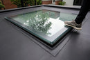 Trafficable walk-on glass rooflight set flush into an EPDM roof terrace deck