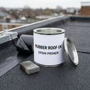 RUBBER ROOF UK EPDM primer tin open on a flat rubber roof edge ready for flashing tape detailing