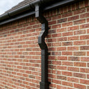 Flush Joint Adjustable Swanneck 72x72mm Aluminium Downpipe — Textured Black (in use)