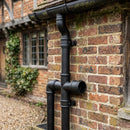 Traditional Aluminium Downpipe Branch 76mm Diameter — Textured Black / 112.5 Degrees (in use)