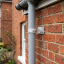 Adjustable Aluminium Pipe Clip 63mm Diameter — RAL 9006 (in use)