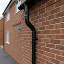 Traditional Adjustable Swanneck 63mm Diameter Aluminium Downpipe — RAL 9005 (in use)