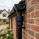 76mm Ø Outlet to Downpipe Length Connector — RAL 9005 (in use)