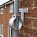 Adjustable Aluminium Pipe Clip 63mm Diameter — RAL 9006 (in use)