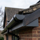 130mm Deepflow Aluminium Gutter Stop End — RAL 9005 (in use)