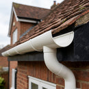 Half Round Aluminium Gutter Outlet 63mm Dia. 125mm — RAL 9010 (in use)
