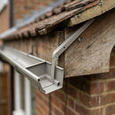Moulded Ogee Gutter Side Rafter Bracket 125 x 100mm — RAL 7036 (in use)