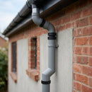 76mm Diameter Flush Joint Adjustable Swanneck Downpipe — RAL 7037 (in use)