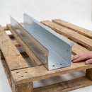 Cut length of deep box profile galvanised steel gutter showing the flat-bottomed channel