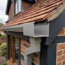 Aluminium Box Gutter Outlet 72×72mm to 135×100mm — RAL 7036 (in use)
