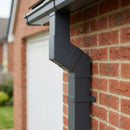 Flush Joint Aluminium Downpipe Bend 72x72mm — RAL 7016 / 112.5 Degrees (in use)