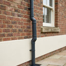 Flush Joint Adjustable Swanneck 63mm Downpipe Connector — RAL 7021 (in use)