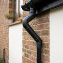 Flush Joint Adjustable Swanneck 63mm Downpipe Connector — Textured Black (in use)