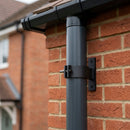 Adjustable Aluminium Pipe Clip 63mm Diameter — Textured Black (in use)