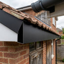 V Return Aluminium Fascia Board 30mm 45° 3m — Textured Black (in use)