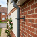 Adjustable Aluminium Pipe Clip 63mm Diameter — RAL 7016 (in use)