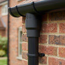 63mm Outlet to Downpipe Length Connector — Textured Black (in use)