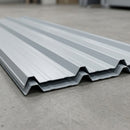 Goosewing grey box profile steel roofing sheets stacked showing the rib profile