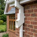 72x72mm Flush Joint Aluminium Downpipe Shoe — RAL 9010 (in use)