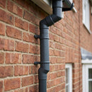 Flush Joint Adjustable Swanneck 63mm Downpipe Connector — RAL 7016 (in use)