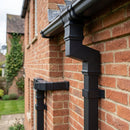 Traditional Aluminium Downpipe Bends 72x72mm – 92.5° & 112.5° — RAL 7021 / 92.5 Degrees (in use)