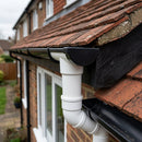 63mm Diameter Gutter Outlet Spigot Extender — RAL 9010 (in use)