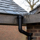 63mm Diameter Gutter Outlet Spigot Extender — RAL 9005 (in use)