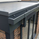 Anthracite grey aluminium box gutter with stop ends and downpipe on a contemporary extension