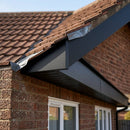 Aluminium Fascia Board Sample — Textured Black / 'V' Return (in use)
