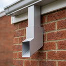 72x72mm Flush Joint Aluminium Downpipe Shoe — RAL 9006 (in use)
