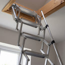 Close-up of the ribbed aluminium treads, scissor arms and telescopic handrail of the compact concertina loft ladder