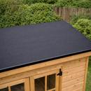Completed garden shed with black EPDM rubber flat roof and plastic edge drip trims - garden roof kit UK