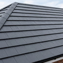 UK pitched roof covered in anthracite interlocking concrete roof tiles