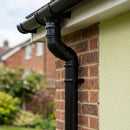 Traditional Adjustable Swanneck 76mm Dia Downpipe Connector — RAL 9005 (in use)