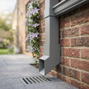 72x72mm Flush Joint Aluminium Downpipe Shoe — RAL 7037 (in use)