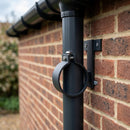 Adjustable Aluminium Pipe Clip 63mm Diameter — RAL 7021 (in use)