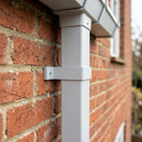 Aluminium Downpipe Clip 72×72mm with 5mm Wall Spacing — RAL 7035 (in use)