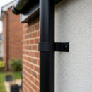 76mm Aluminium Downpipe Clip – Flush Joint — RAL 9005 (in use)