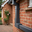 Flush Joint Aluminium Downpipe Bend 72x72mm — RAL 7016 / 92.5 Degrees (in use)