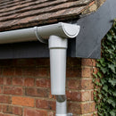 63mm Diameter Gutter Outlet Spigot Extender — RAL 9006 (in use)