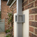 Aluminium Downpipe Clip 72×72mm with 5mm Wall Spacing — RAL 7036 (in use)