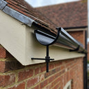 130mm Rise and Fall Gutter Bracket for Deepflow Aluminium System — RAL 9005 (in use)