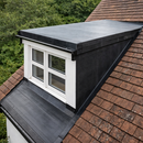 Completed EPDM dormer flat roof on tiled house using 2.5mm full-bond self-adhesive membrane - EPDM dormer roofing UK