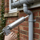 380ml Grey Silicone Sealant for Rainwater Pipe Joints — RAL 9006 (in use)