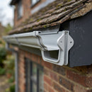 Moulded Ogee Gutter Fascia Bracket 125 x 100mm — RAL 7035 (in use)