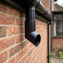 63mm Diameter Flush Joint Aluminium Downpipe Shoe — RAL 9005 (in use)