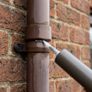 380ml Grey Silicone Sealant for Rainwater Pipe Joints — RAL 7022 (in use)