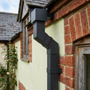 Flush Joint Adjustable Swanneck 72x72mm Aluminium Downpipe — RAL 7021 (in use)