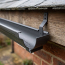 Moulded Ogee Gutter Top Rafter Bracket 125 x 100mm — RAL 7022 (in use)