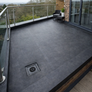 Finished self-adhesive EPDM flat roof terrace with drain outlet and glass balustrade - 2.5mm self-adhesive membrane UK